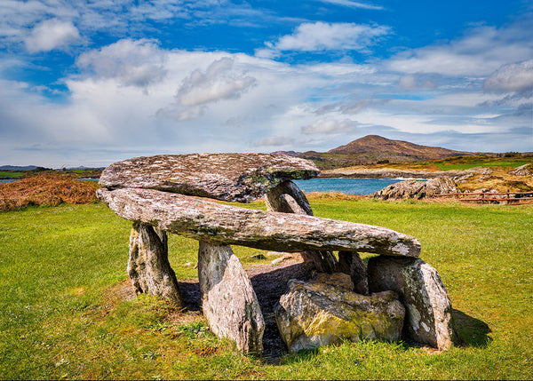 Altar Wedge Tomb West Cork Ireland ancient stone megalithic monument coastal landscape under blue sky by Irish landscape photographer John Taggart