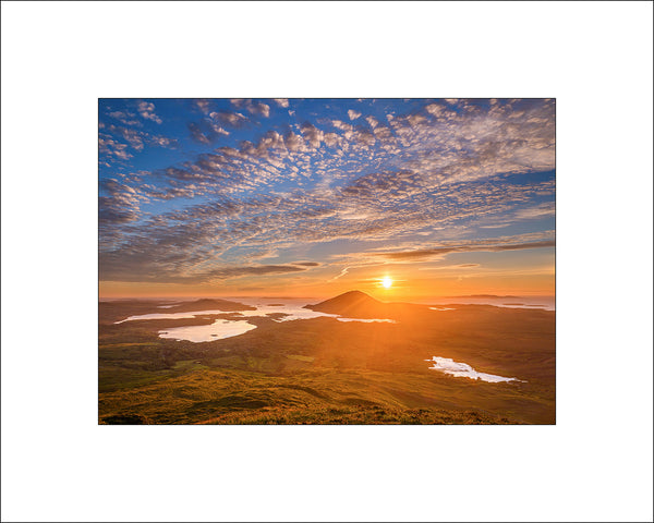 Summer Sunset from Diamond Hill looking towards Innishboffin and the Atlantic Ocean from Connemara in County Galway by John Taggart Landscapes