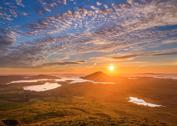 Connemara sunset landscape with golden light over lakes and mountains, Irish landscape photography print by John Taggart