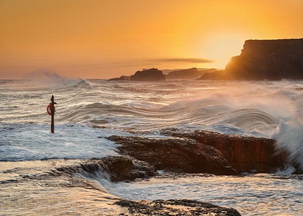 Ballintoy Harbour sunrise waves crashing against rocks County Antrim Northern Ireland coastline photography