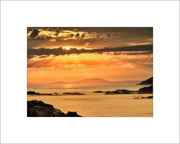 A stunning sunrise picture By John taggart landscapes take from Ballycastle on Ireland's north coast looking across to the Mull of Kintyre