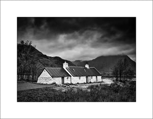 The little bothy known as Blackrock Cottage on Rannoch Moor near Glencoe in the Scottish Highlands by John Taggart Landscapes