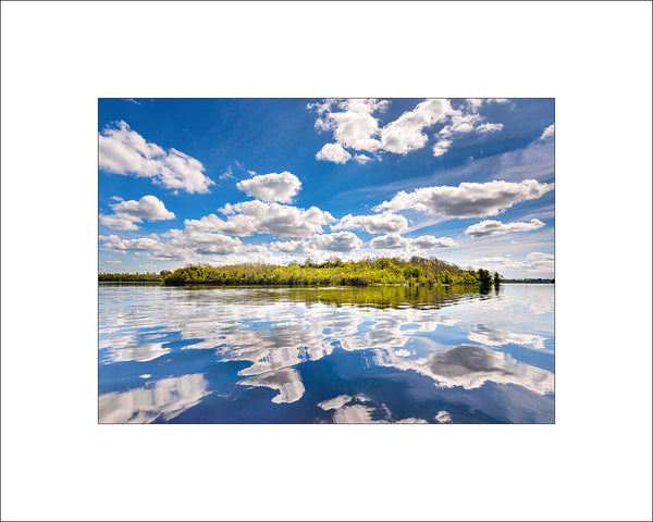 Carr Island reflected in Lough Erne County Fermanagh on a beautiful spring day by John Taggart Landscapes