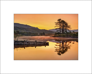 Sunrise on beautiful Cloonee Lough on the Beara Peninsula in County Kerry by John Taggart Landscapes