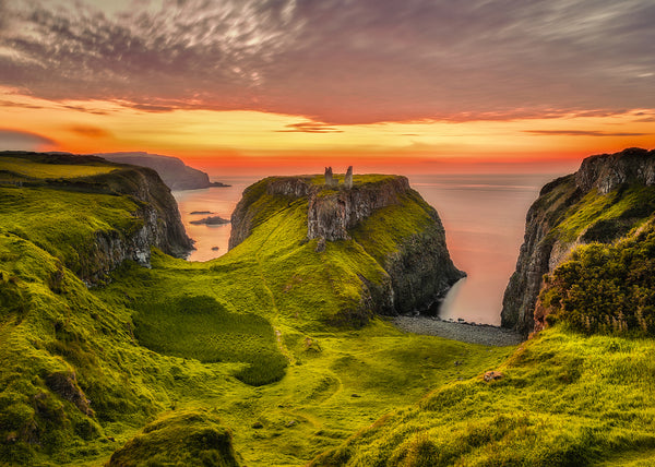 Dunseverick Castle ruins at sunset on the Causeway Coast County Antrim Northern Ireland landscape photography