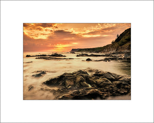 Sunrise at Ballycastle on Ireland's north coast overlooking Fair head by Irish landscape photographer John Taggart