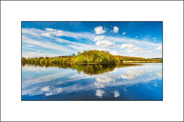The beautiful Ferny Island reflected on Lough Erne in County Fermanagh Northern Ireland by Irish Landscape Photographer John Taggart