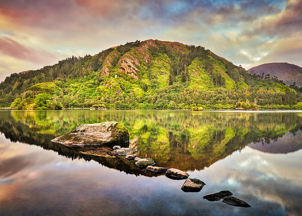 Glamore lake reflection County Kerry Ireland calm water mirror reflection stepping stones and forest hillside