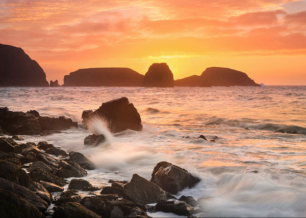 Kilfarrasy sunrise Waterford Ireland sea stacks golden sky waves long exposure