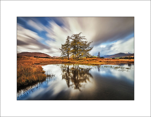 Autumn colours reflected in Loch Tulla by John Taggart Landscapes