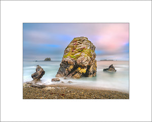 Early morning light on the sea stacks near Malin Head Inishowen Peninsula in County Donegal by John Taggart Landscapes