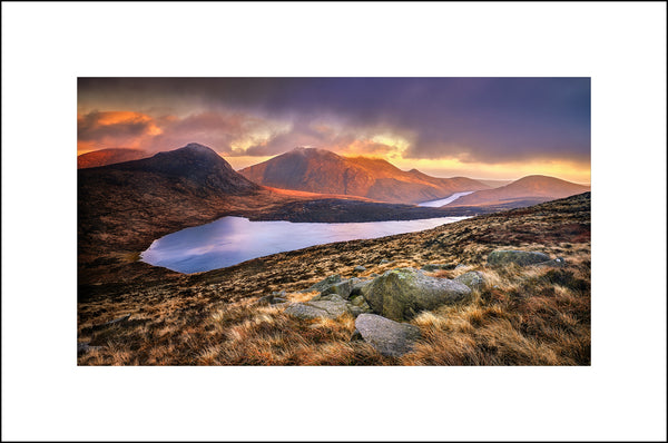 Evening light over Lough Shannagh in the mountains of Mourne by John Taggart  Landscapes