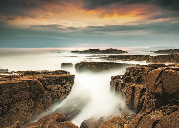 Mullaghmore coastline Sligo Ireland long exposure seascape with rocky formations and misty Atlantic ocean