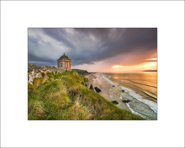 Spring sunset at Mussenden Temple in County Derry sitting high above the Atlantic Ocean, overlooking Downhill Strand across to County Donegal by Irish Landscape Photographer John Taggart
