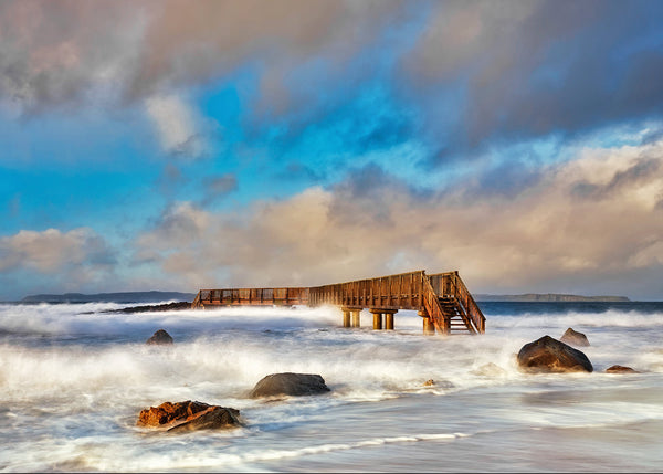 A picture of The Wooden Bridge at Pan's Rock near Ballycastle County Antrim looking onto Rathlin Island.