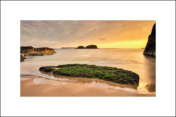 Sunrise at Ballintoy overlooking Sheep Island in beautiful County Antrim by John Taggart Landscapes