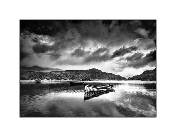 A Boat named Tir Na Nog reflected at Killarney National Park County Kerry Ireland by John Taggart Landscapes