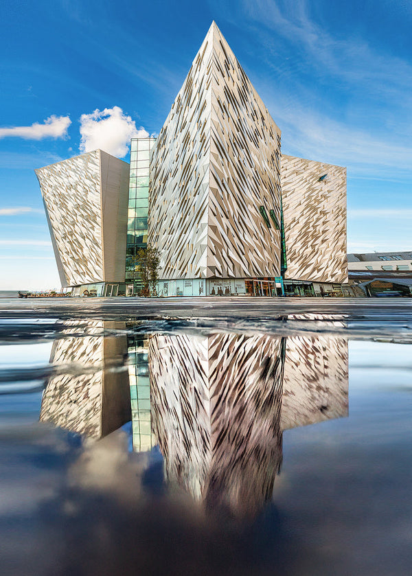 Striking architectural photography of Titanic Belfast, captured with perfect reflection and crisp detail under a blue sky.
This iconic image from Northern Ireland showcases the modern design and cultural significance of Belfast's Titanic Quarter. A fine art print by John Taggart Landscapes, ideal for home or office decor.