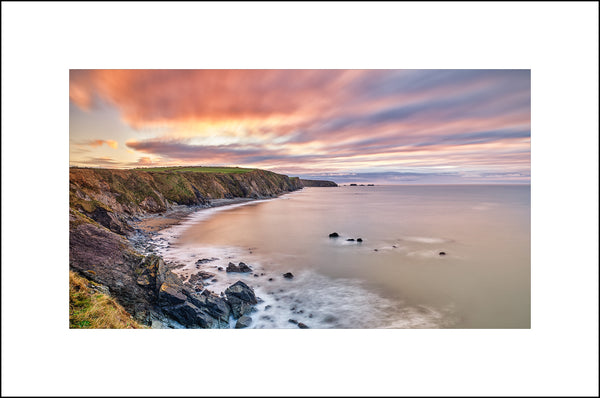 Morning light at Whitefield Bay in County Waterford Ireland by John Taggart Landscapes