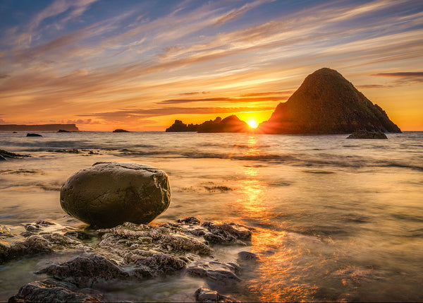 Whitepark Bay sunset County Antrim Ireland sea stack golden light