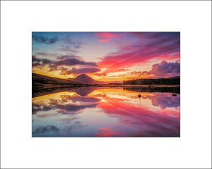 Mount Errigal is a 751-metre mountain near Gweedore in County Donegal, Ireland. It is the tallest peak of the Derryveagh Mountains and the tallest peak in County Donegal. Errigal is also the most southern, steepest and highest of the mountain chain, called the "Seven Sisters" by locals. By John Taggart Landscape Photography