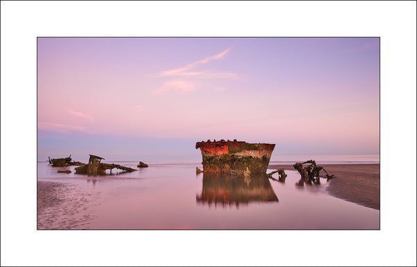 Baltray shipwreck and reflection at sunset by John Taggart Irish Landscape Photographer