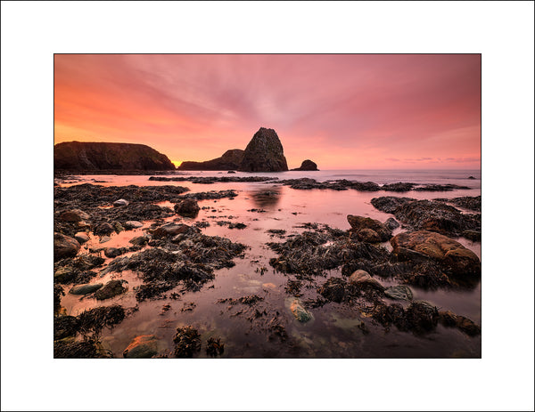 Sunrise on Ireland's east coast at Kilfarassy in Co Waterford by John Taggart Landscape Photographer
