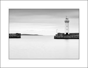 Donaghadee Lighthouse in black & white landscape photography by john taggart