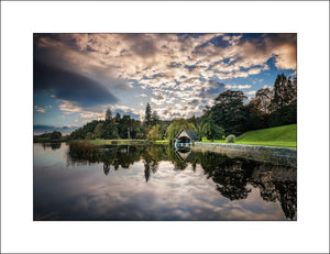 Reflected evening light on Glaslough and boathouse in Co Monaghan Ireland by John Taggart Landscape Photography
