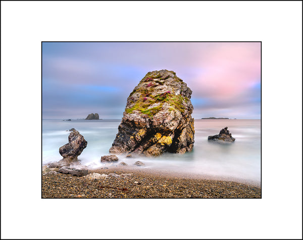 Morning light on the sea stacks near Malin Head in Co Donegal Ireland by John Taggart Landscape Photographer